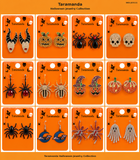 Wholesale Halloween earring assortment JCE111 with 12 different pumpkin, spider, skull, witch, bat, moon and ghost earring styles by Taramanda