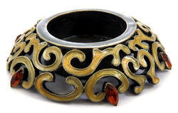 Gold colored, filigree designed candle holder with a few orange, pointed oval shaped rhinestone accents CH4